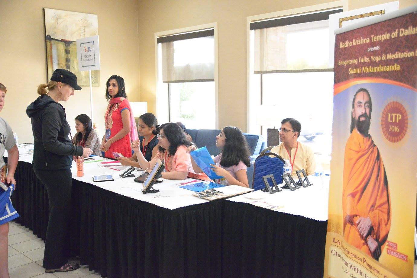 Volunteers working during International Festival of Yoga